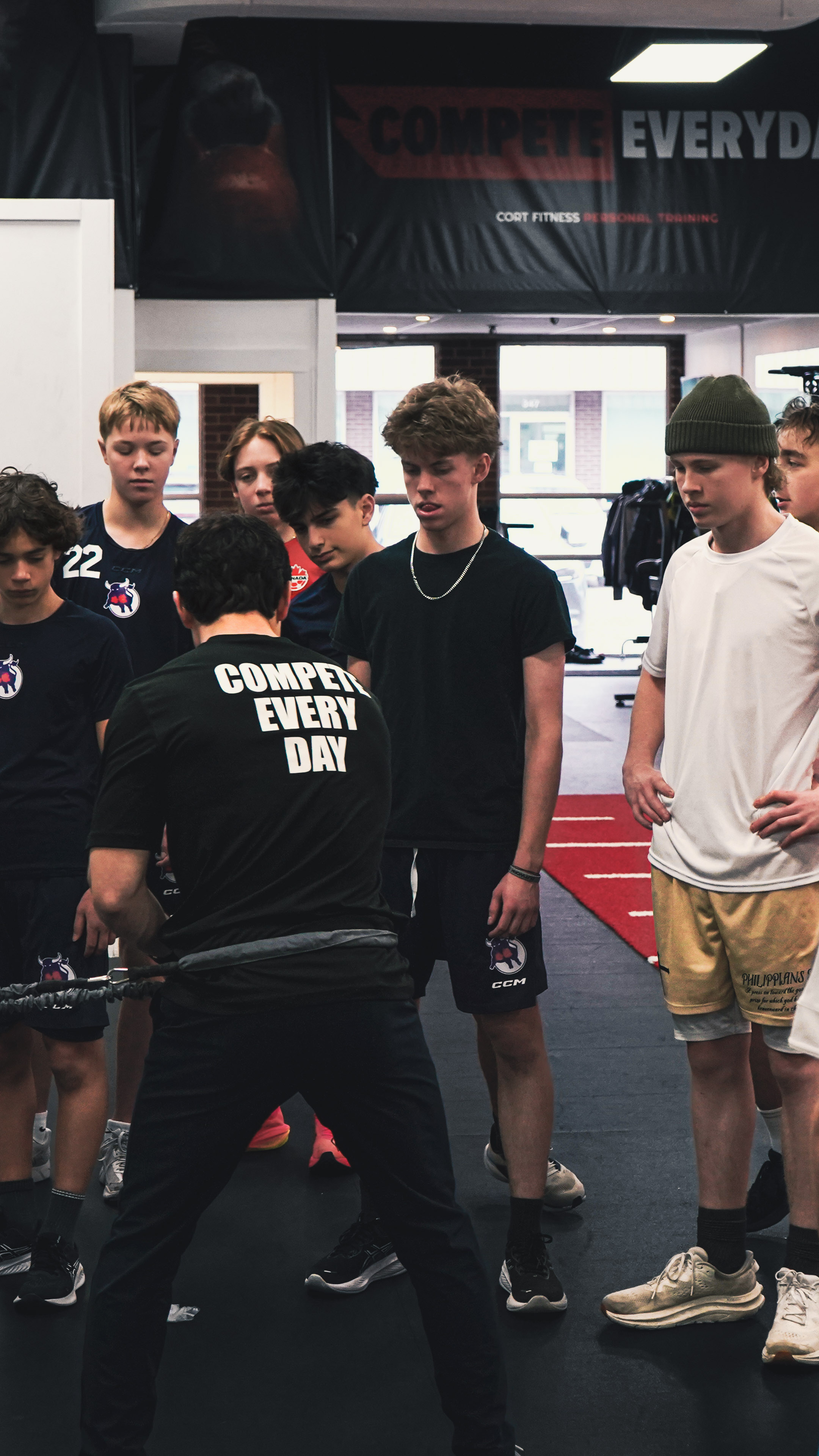 Coach Andrew with youth athletes during sport specific training